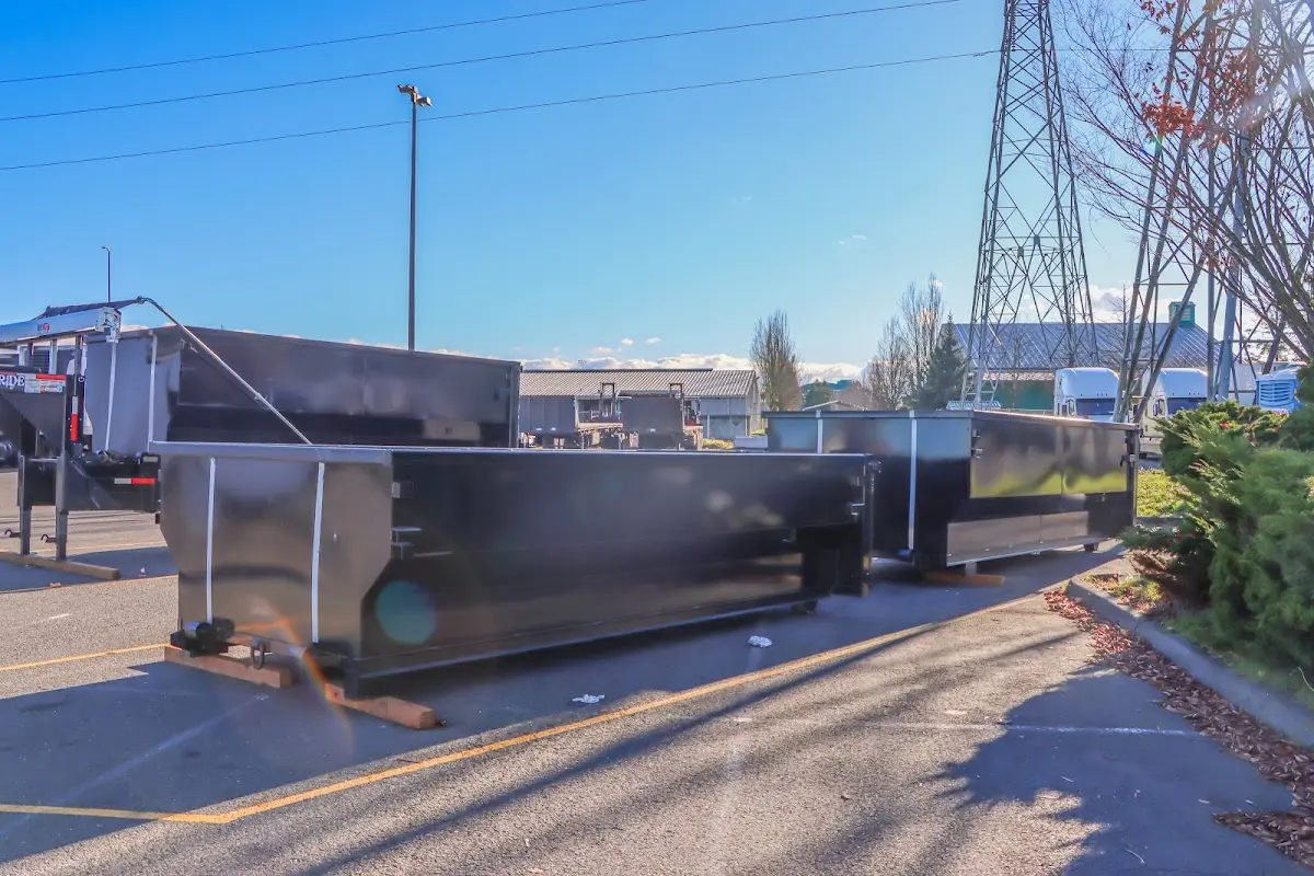 Roll-off dumpster ready for waste disposal at job site for 2 Yard Dumpster Rental in South Charleston
